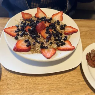 Oatmeal with granola and berries.
