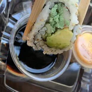 sushi with chopsticks