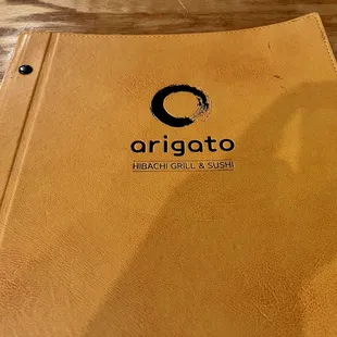 Menu cover with restaurant logo (Dec. 2022)