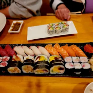 a variety of sushi on a platter