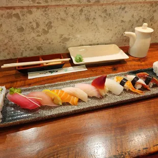 Might look pretty but those nigiri slices are unacceptably thin. $29 for Sushi Deluxe. Not worth it.