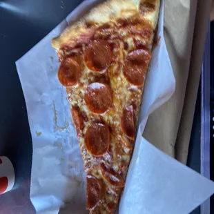 Pepperoni pizza slice