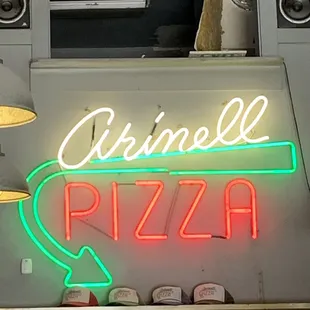 a neon sign for a restaurant