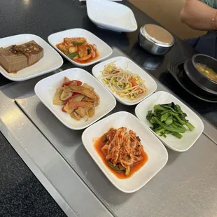 Banchan (side dishes accompany our Korean feast)