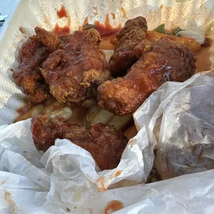 chicken wings in a styrofoam container