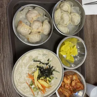 Pork dumpling(right) kimchi dumpling (left), and sesame nooodles
