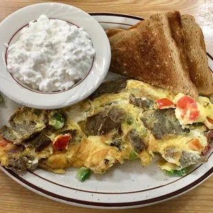 Greek Omelette (3 eggs) with cottage cheese  (instead of home fries) and toast