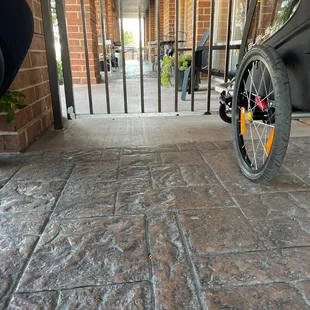 a bicycle parked in front of a building