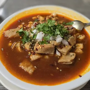 Menudo and chiliquilas requested potatoes instead of rice and beans with an egg on top