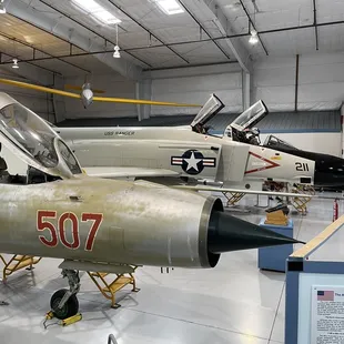 MIG-21 in foreground and F-4 in background.