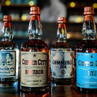 three different bottles of whiskey