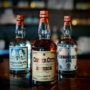 three bottles of whiskey