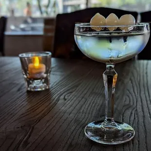 a glass of water with eggs in it