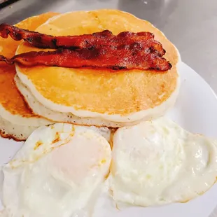 Pancake breakfast with 2 eggs and bacon