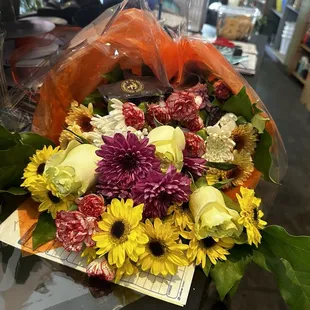 The bouquet he created for my friend!!! The green roses were so beautiful all the colors blended so well!