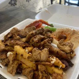 Chicken Shawarma Platter, upgrade to Greek fries an extra $2.50. Not $2.50 worth of feta added however