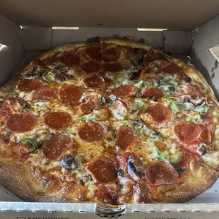 Pizza ordered in the cart out box. Pepperoni, mushroom, and jalapeño.