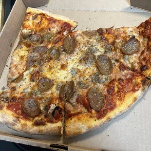 Mushroom and sausage pizza.