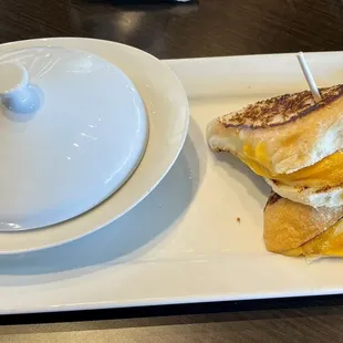 6-cheese grilled cheese and a tureen of soup.