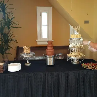Chocolate fountain with a variety of desserts designed to satisfy everyone's sweet tooth.