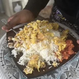 Oil rice with eggs and hot pepper