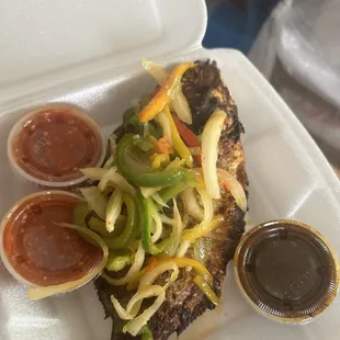 Grilled tilapia with banku