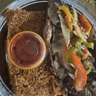 Jollof rice with grilled tilapia