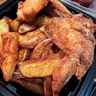 Broasted wedges and a couple wings from the 6 wing order.