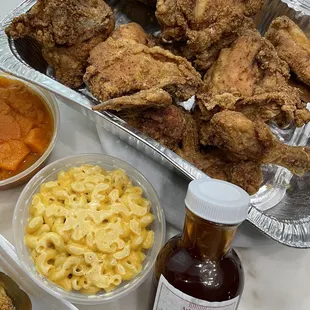 10 piece dark, Mac n cheese, their own sauce, and yams