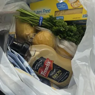 a grocery bag full of groceries