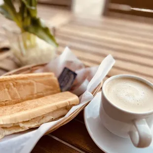 Cafe con Leche! 
Wake up your morning with our strong cafe con leche served with Cuban toast!