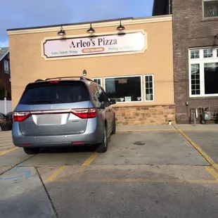 The exterior of Arleo&apos;s Pizza. It is smaller on the inside.