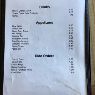 a menu on a wooden table