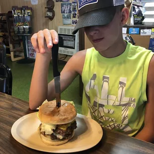 He ate the “Gabe” burger , arley fries and half his sisters Arley burger !