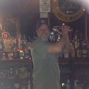 a man holding a beer