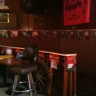 a bar with chairs and tables