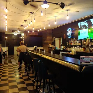 a bar with a checkered floor