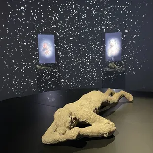Pompeii exhibit - body cast of a young girl who died from volcanic ash