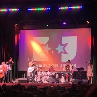 a band performing on stage