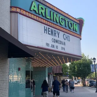 people walking down the sidewalk