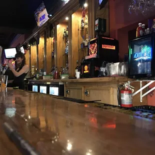 a woman sitting at the bar
