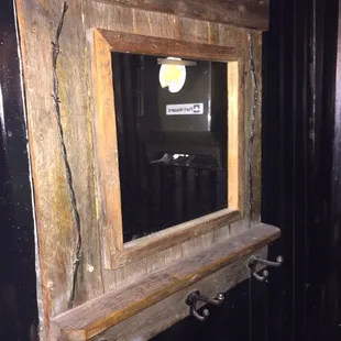 One of the mirrors in the men&apos;s room