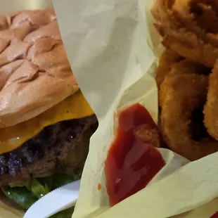 Jalapeno cheeseburger and onion rings.