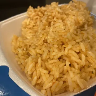 Dry hard, uncle Ben style rice w tomato sauce. Not authentic. A Mexican mom would be very disappointed.