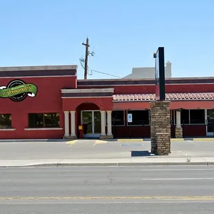 a red building with a red roof