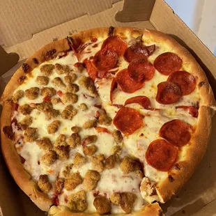 Deep dish pizza, half pepperoni and half sausage