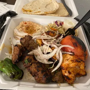 a meal in a styrofoam container