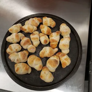 a pan of croissants