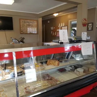 a display of meats and pastries