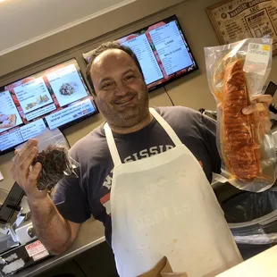 Owner, Mr Armond, holds up his no-Sugar beef jerky and newest creation!!